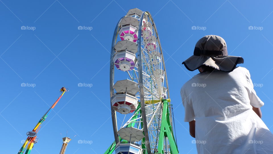 View of ferris from ground while waiting for a ride