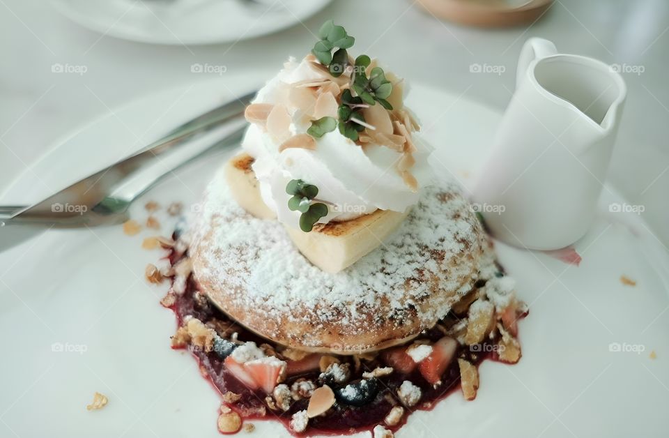 Fruit Pancakes and Whipped Cream garnish with real fruit