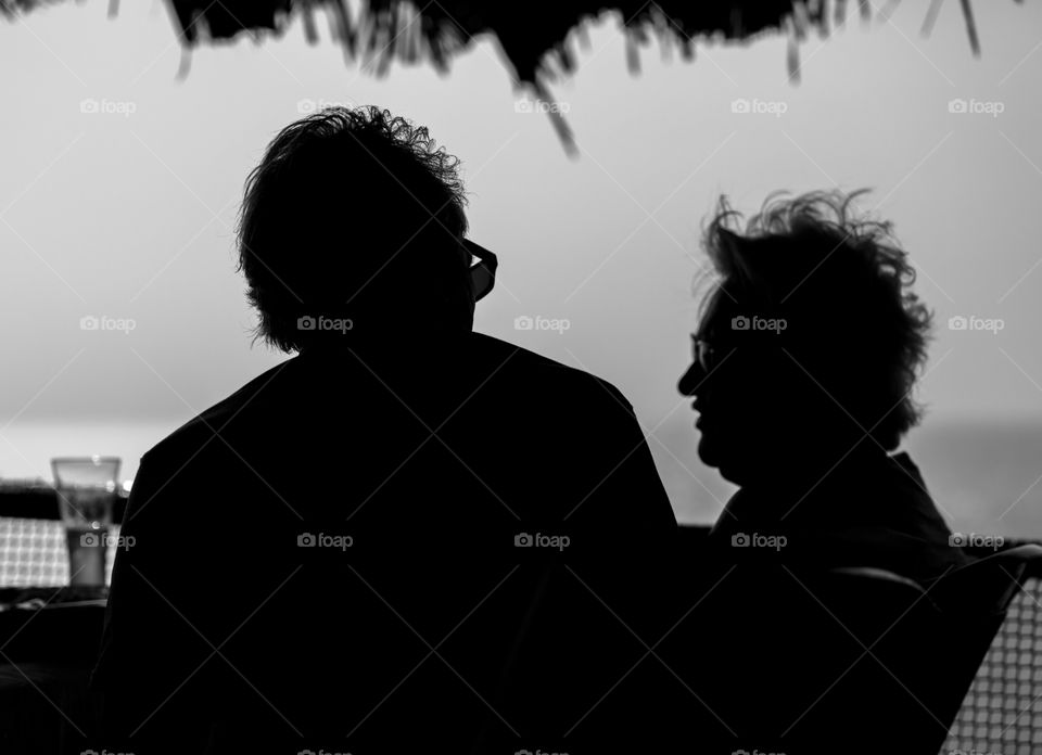 one old couple in conversation