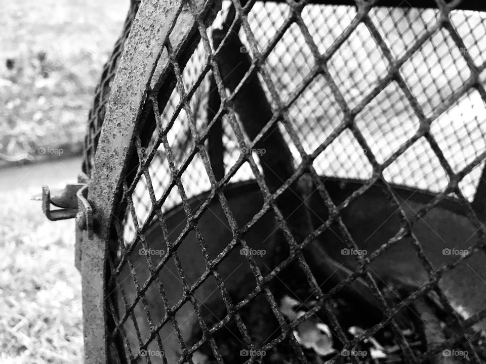 The rusted chimera before a camp fire. 