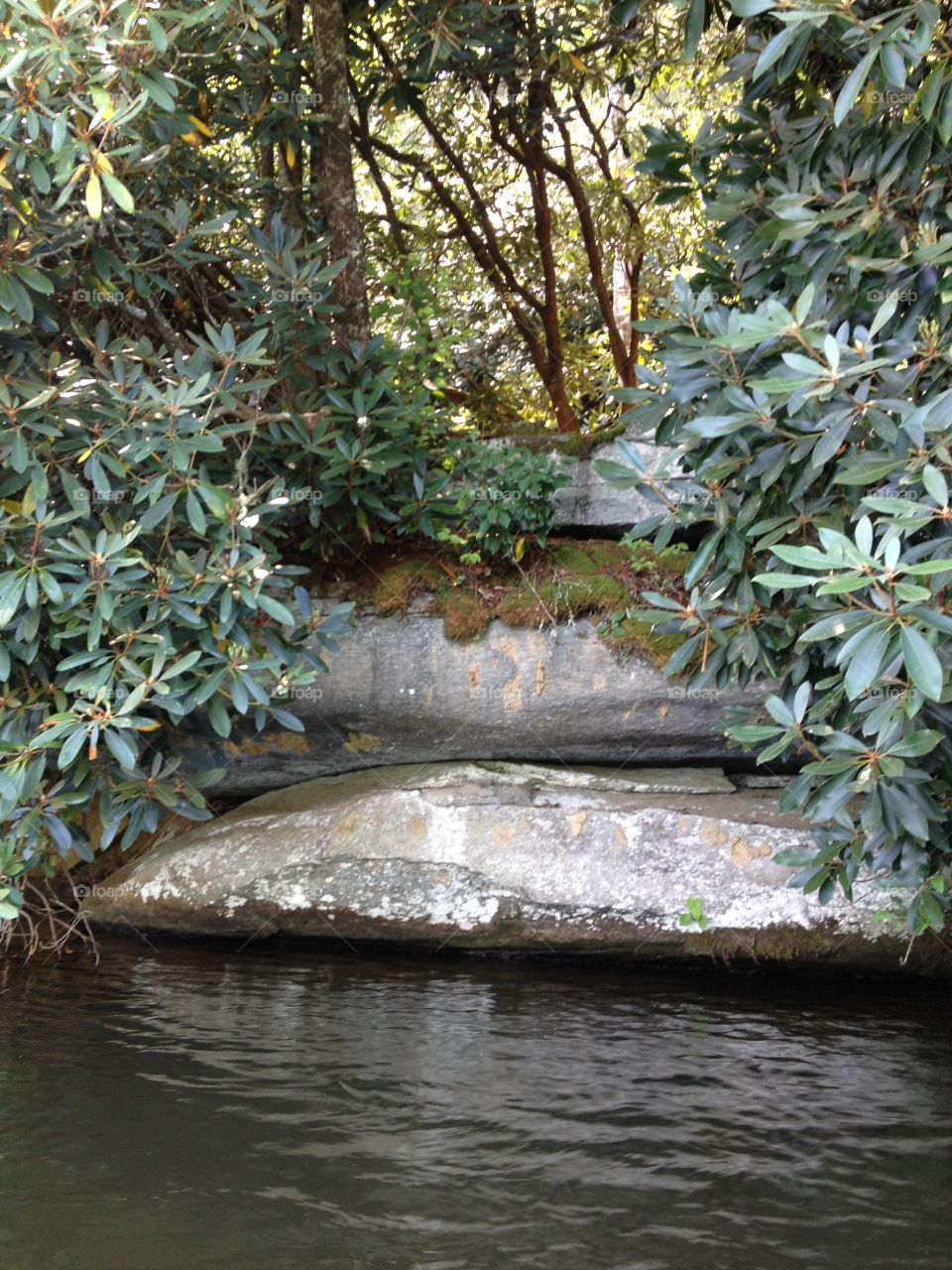 Layered stones. Lake side view