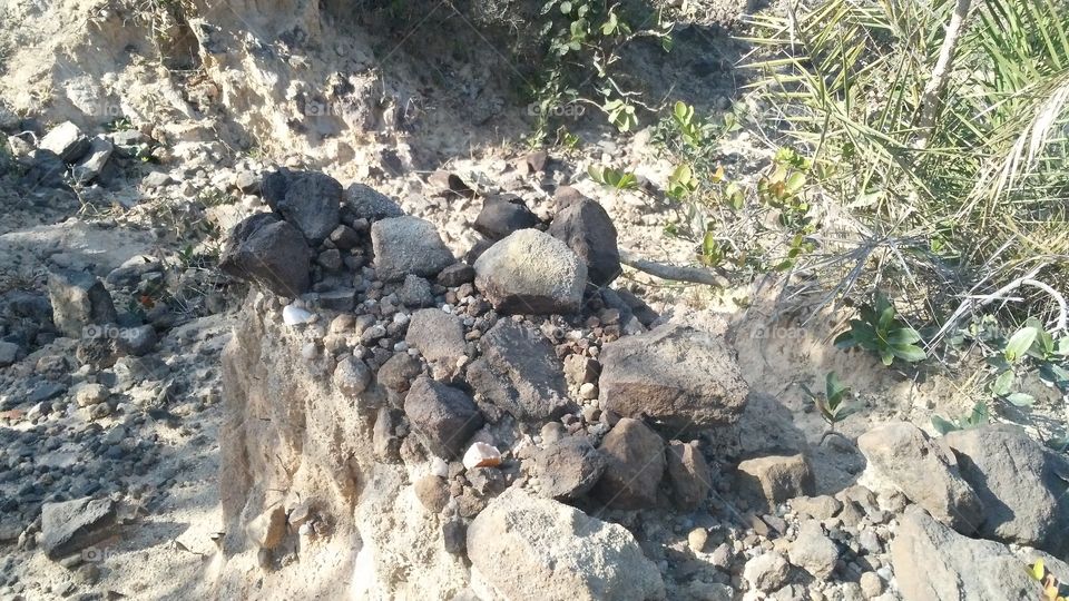 A beautiful scene of stones in the hill's edge.
