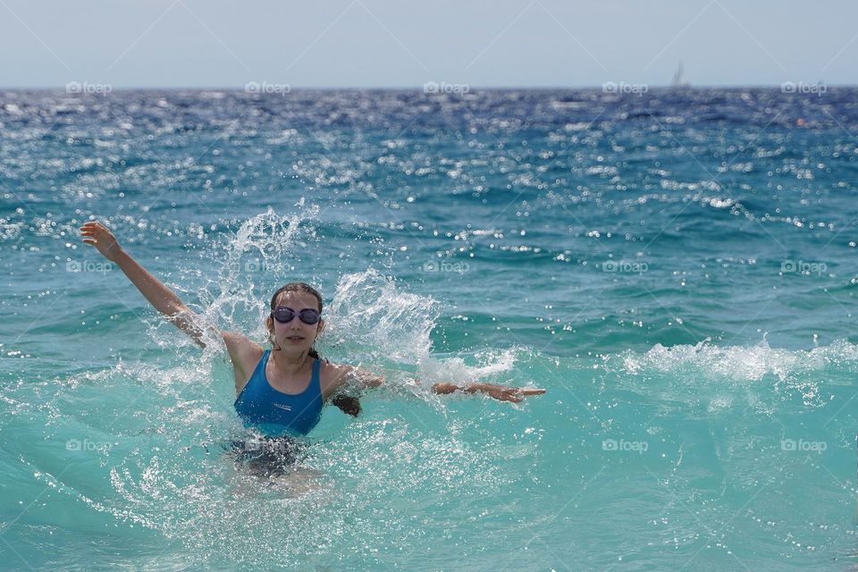 Girl swiming in the sea