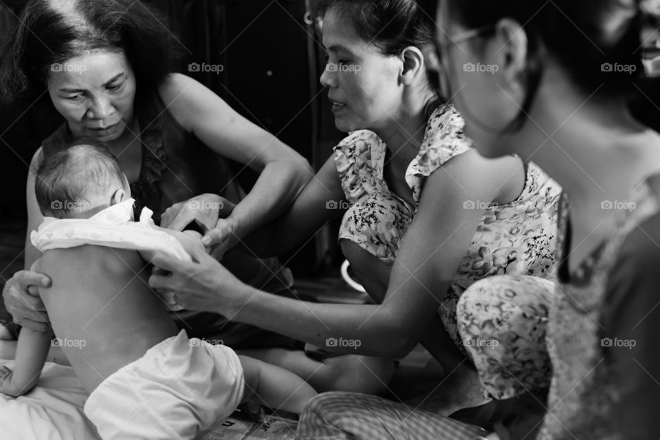 Women taking care of a baby