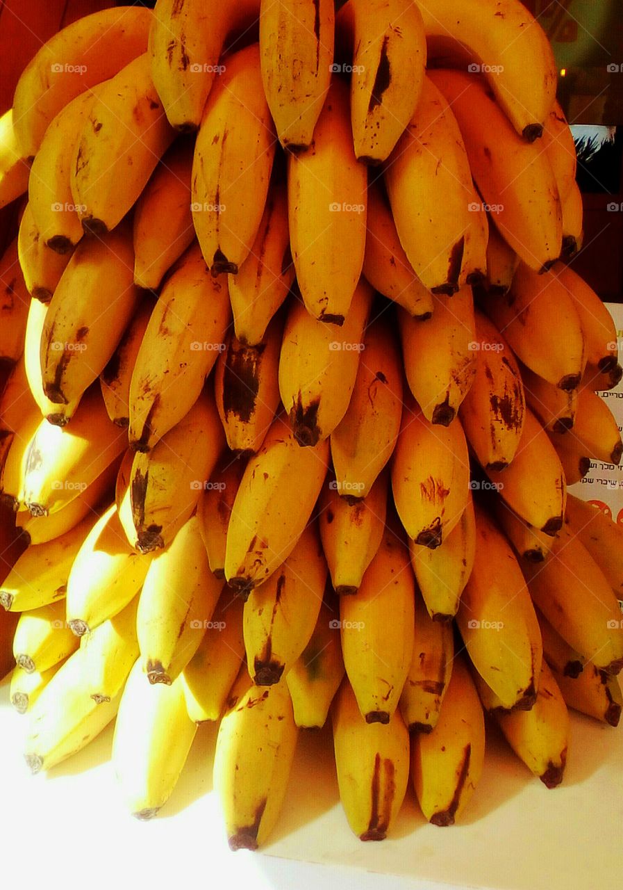 Big large bunch of golden bananas outdoors in closeup in sunny day# 
freshness#healthy#farm#diet