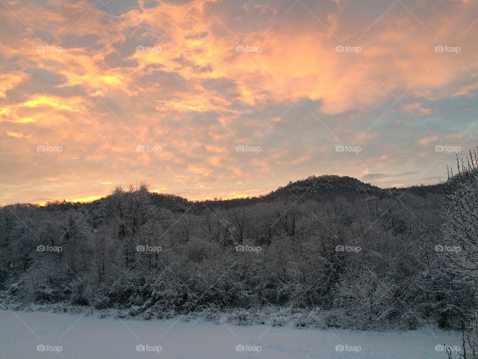 Pink Mountain Sky  . Snow day with a pink sky. 