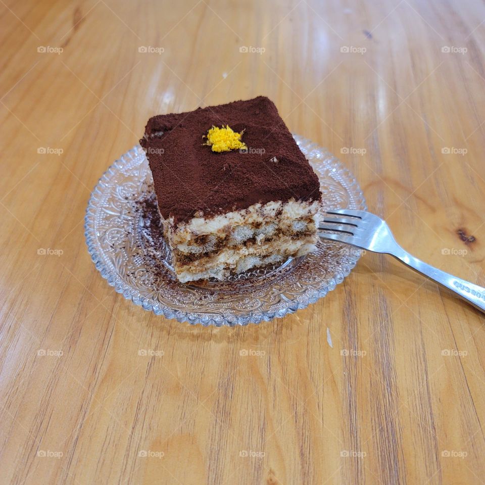 tiramisu on glass plate.Tiramisu in a glass dish