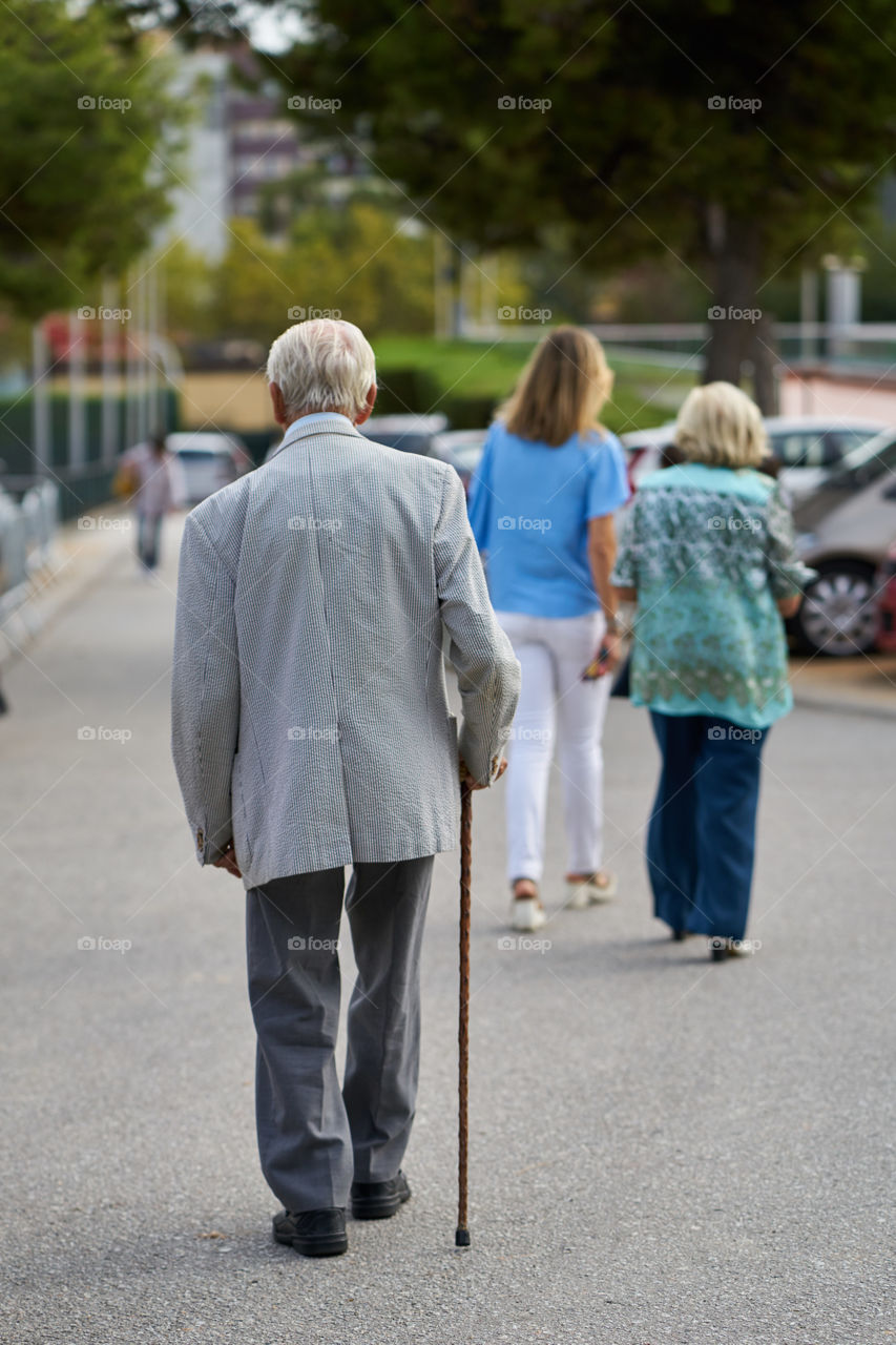 Walking elderly man