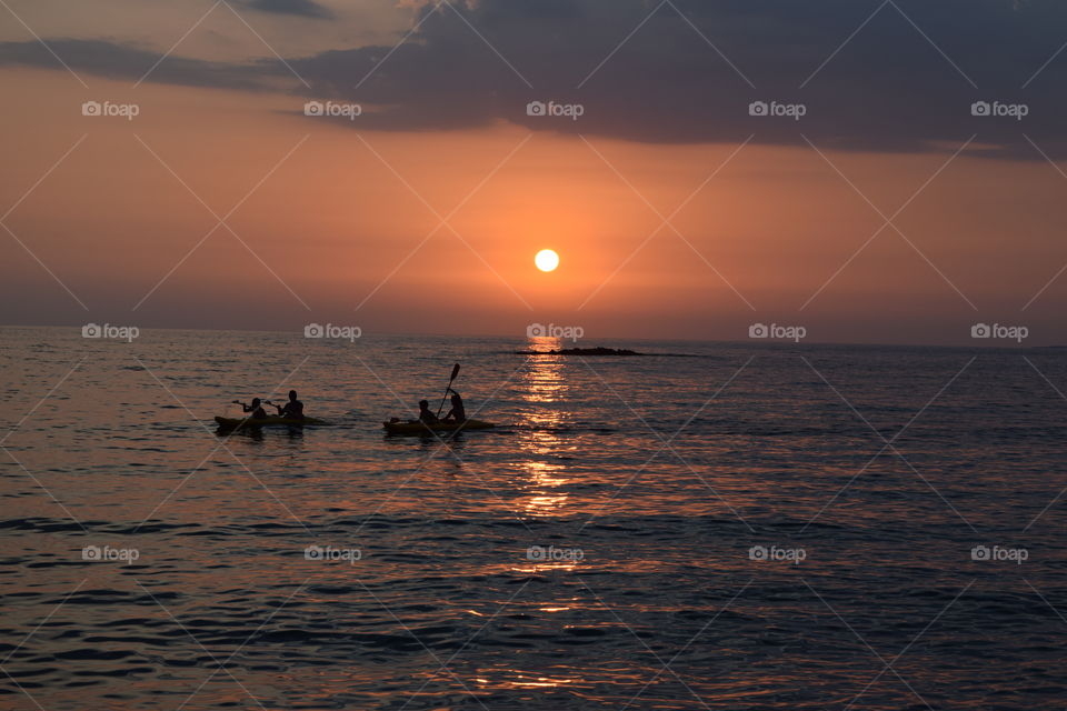 Greece summer sunset canoeing. Greece summer sunset canoeing