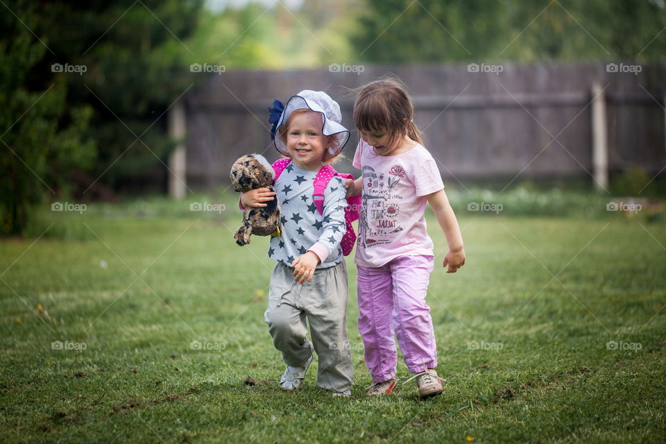 Little sisters in park