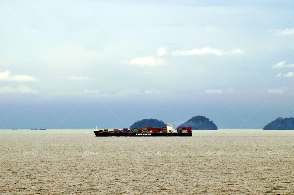 Ship passing through Malacca Straits