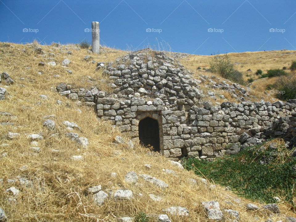 Troglodyte house in stone in Greece