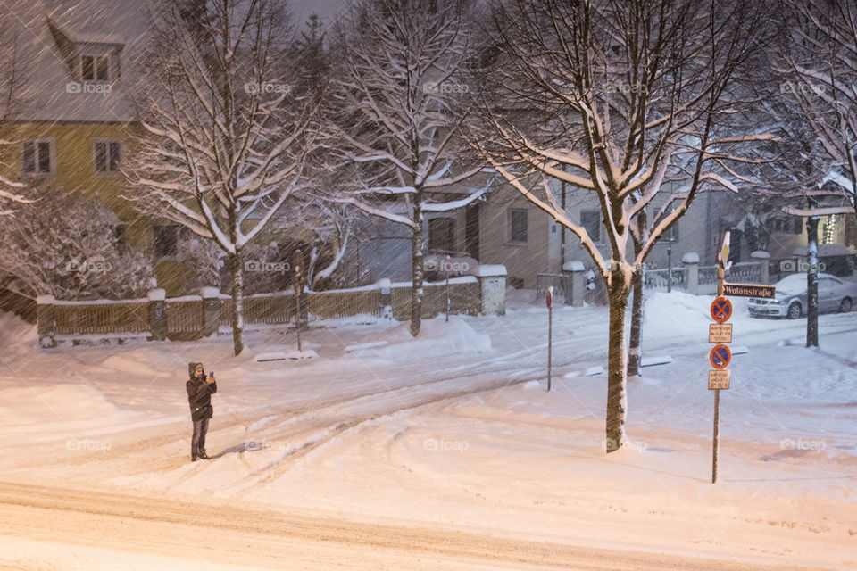 Man photographing the winter scene 