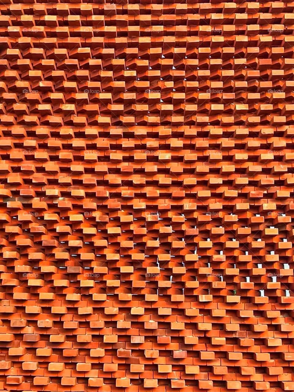red brick wall.  red background full frame