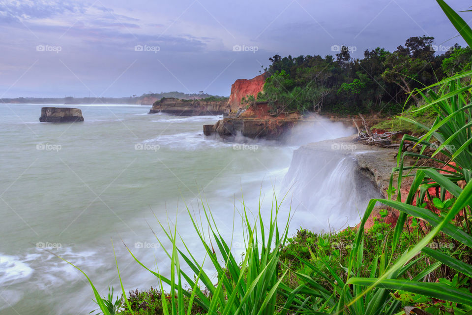 splash of waves in coral beach