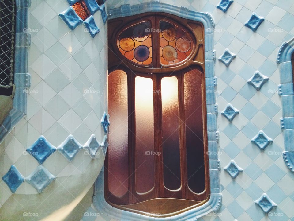 Window view of casa batllo with beautiful tile in Barcelona Spain 