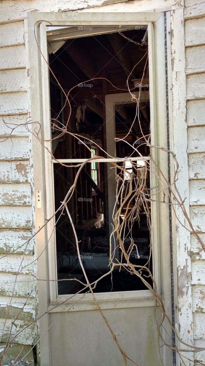 abandoned house door