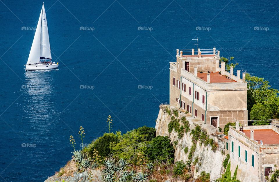 View of a sailboat sailing in sea