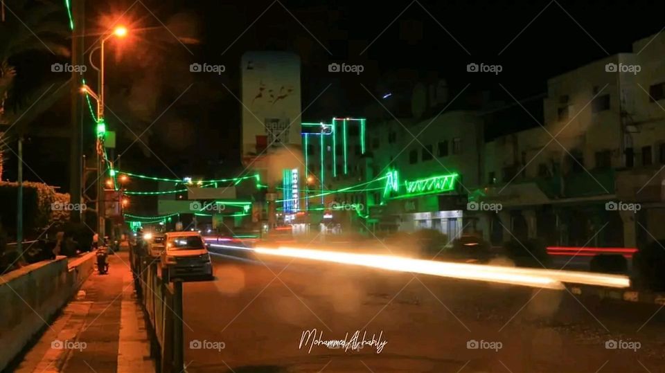 A very beautiful picture, and there is no better picture than it. There is no better picture of green herbs and colorful, red and white roses than it. Glory be to God, the natural and picturesque view, and there is no more