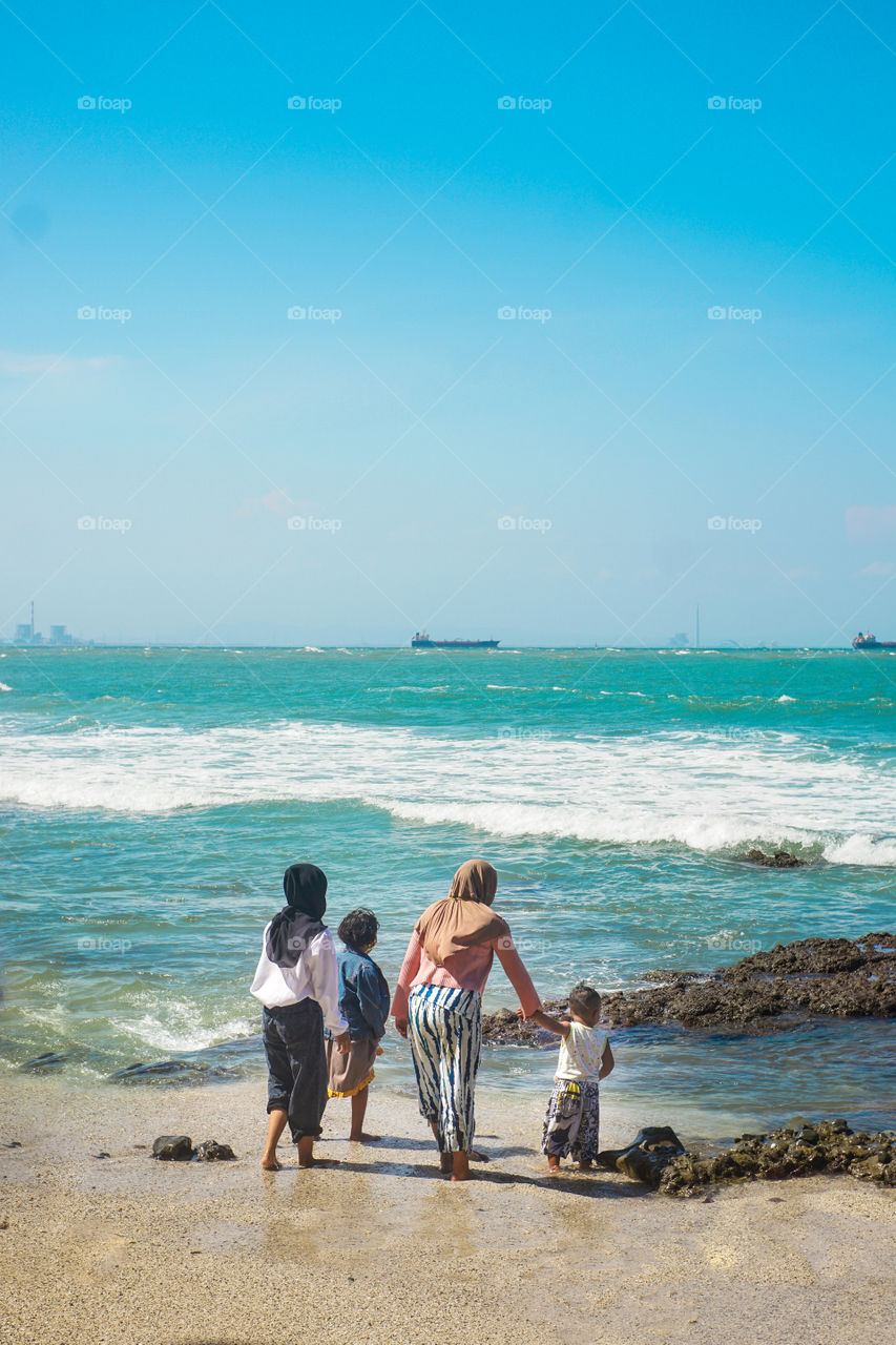 People enjoy their time at the beach