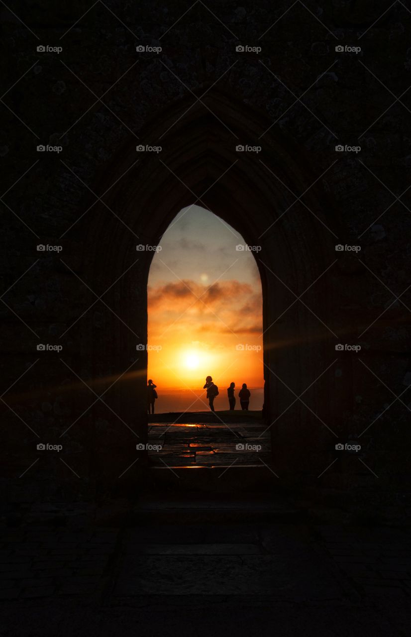 summer sunrise over glastonbury hill