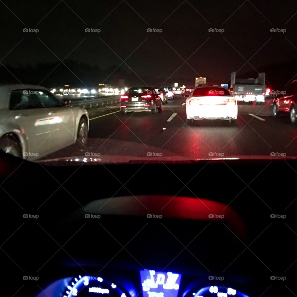 Boston Highway Night Traffic

Typical picture of stopped traffic during rush hour heading South out of Boston. 