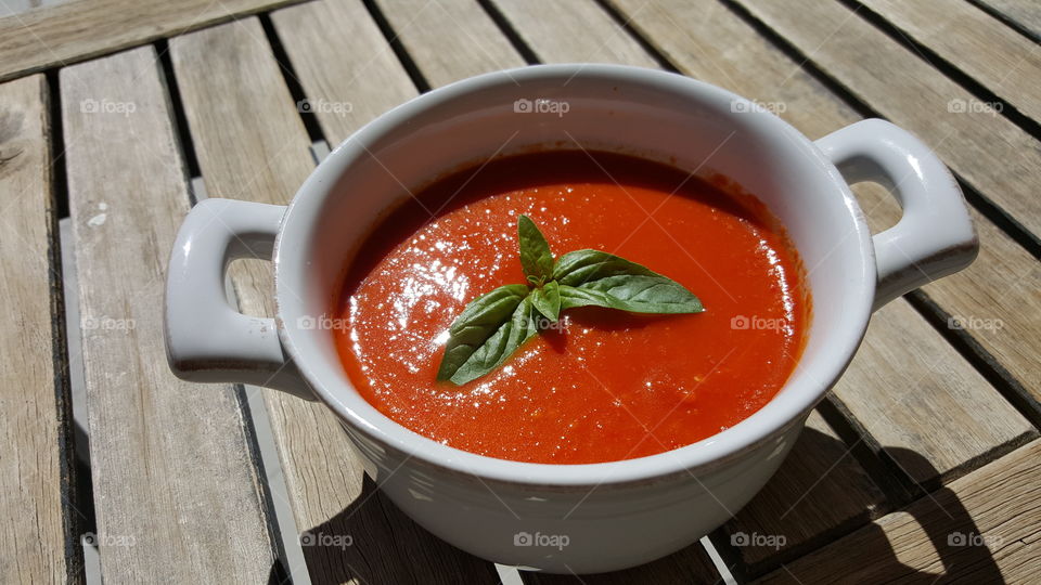 High angle view of tomato soup