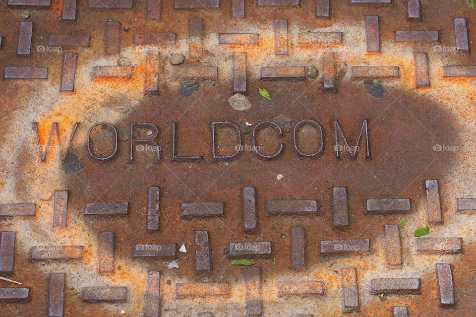 A WorldCom manhole cover photographed May 15, 2017. This telecommunications corporation filed the largest bankruptcy in U.S,A history in 2002.