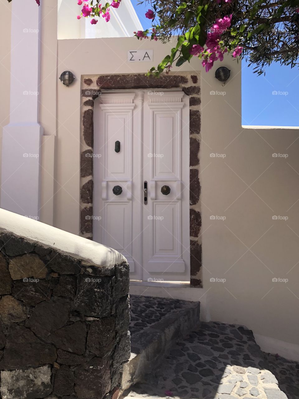 Greek Door hotel room suite white stone romantic private