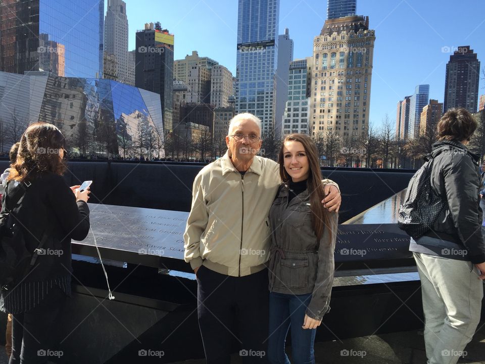 My grandfather, a retired port authority officer, and myself in front of the 911 memorial. Truly beautiful 