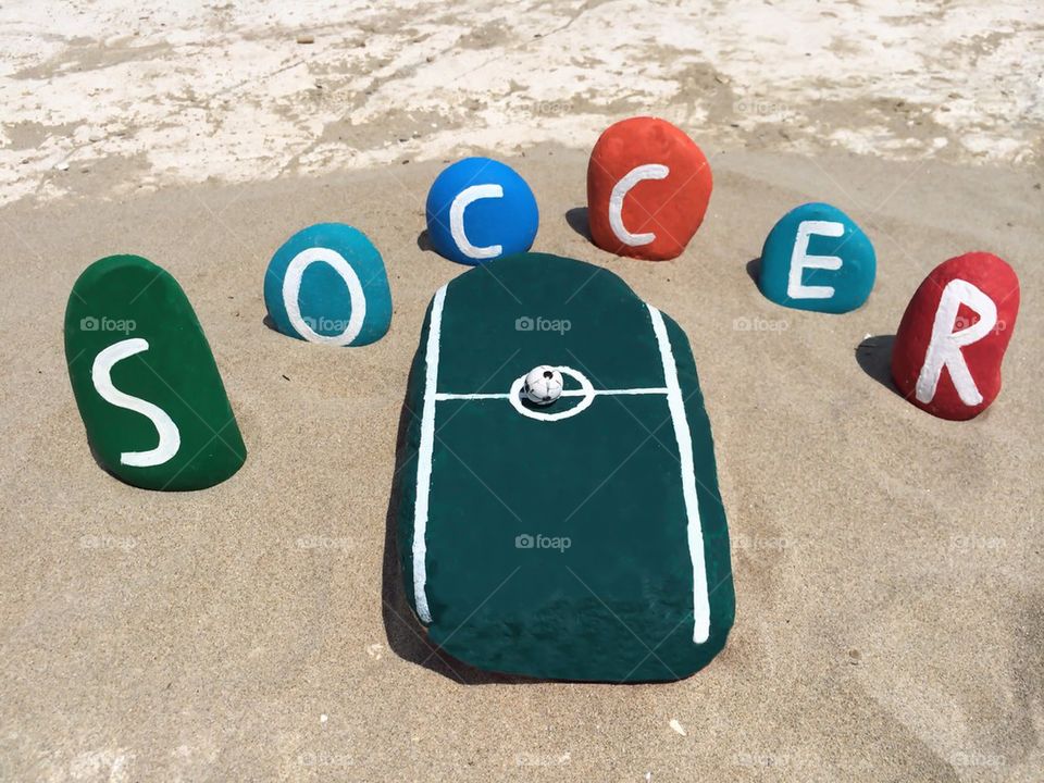 Soccer concept on stones