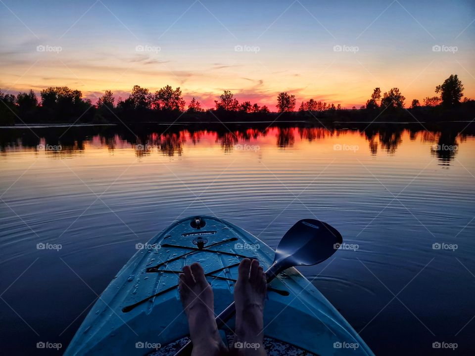 paddleboard sunset