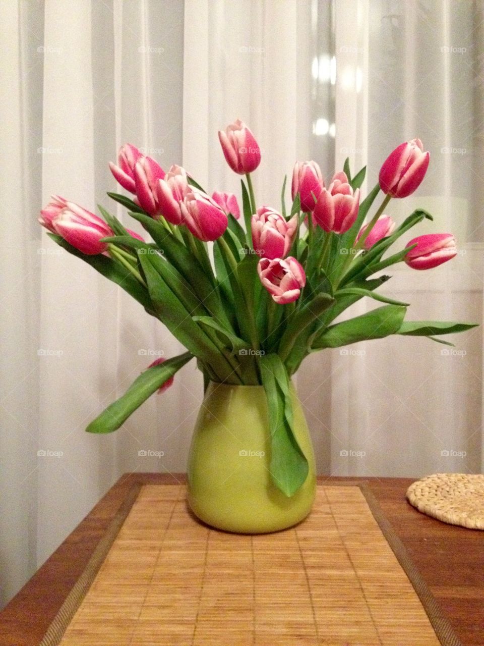 Tulips in the bowl on a stand