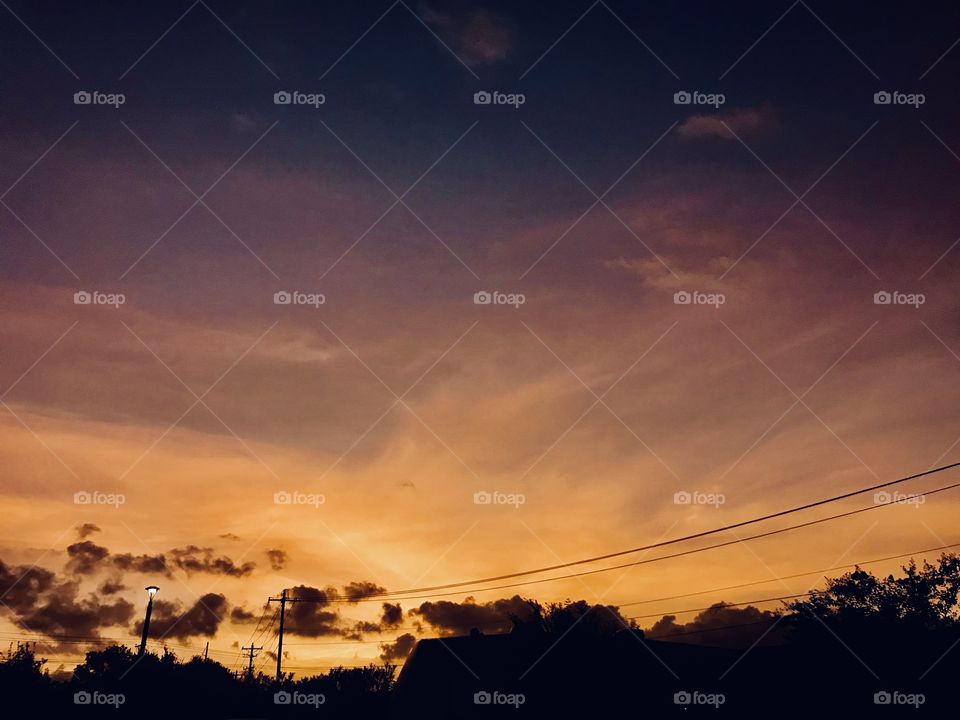 Dramatic Cloud Mass colliding with the Early morning bright colors of the Sun’s Energy to insure that there will be a Great Sunrise.