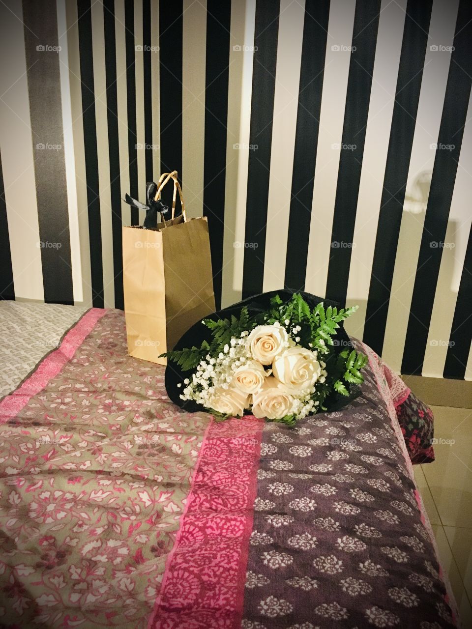 A gift and flowers