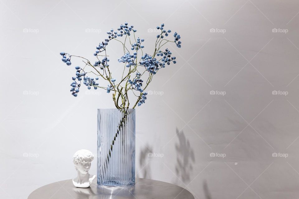 Blue flower in vase