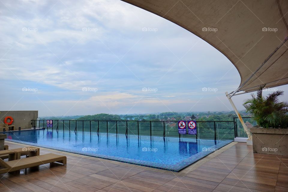 A rooftop swimming pool in the hotel in Jogjakarta, Indonesia