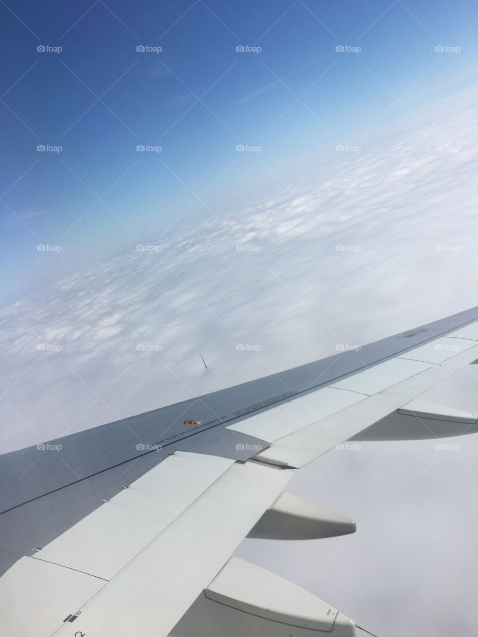 freedom tower topping the clouds