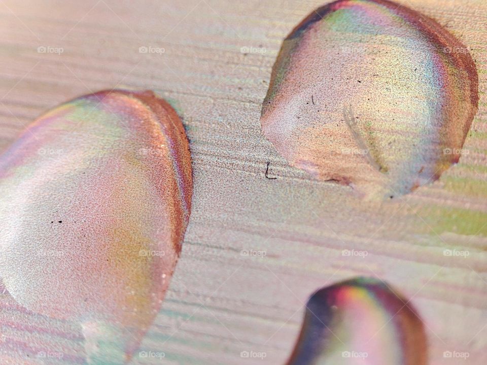 Droplets on a colourful background