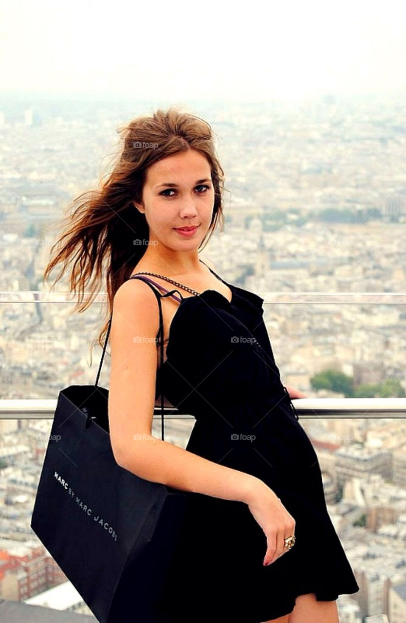 Girl in Paris. Girl standing in the Montpernasse tower  in Paris