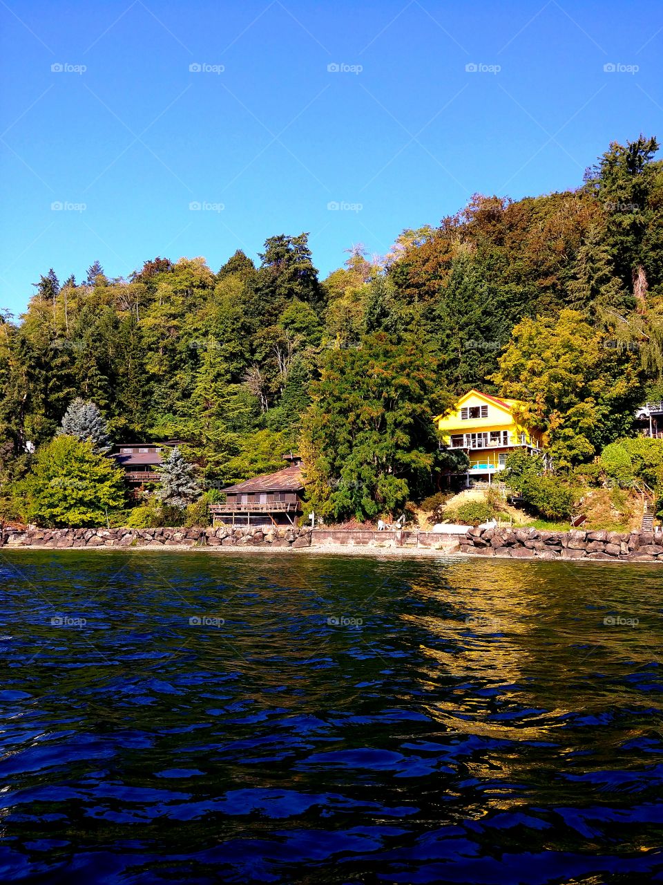 I really love how yellow this house is. Its crazy noticeable from the water.