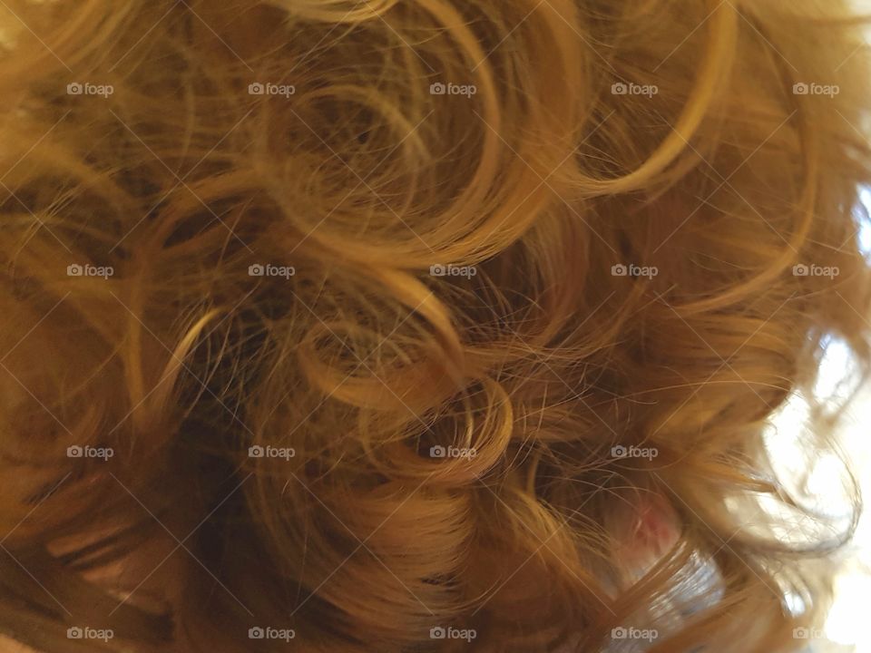 Soft, golden baby curls.