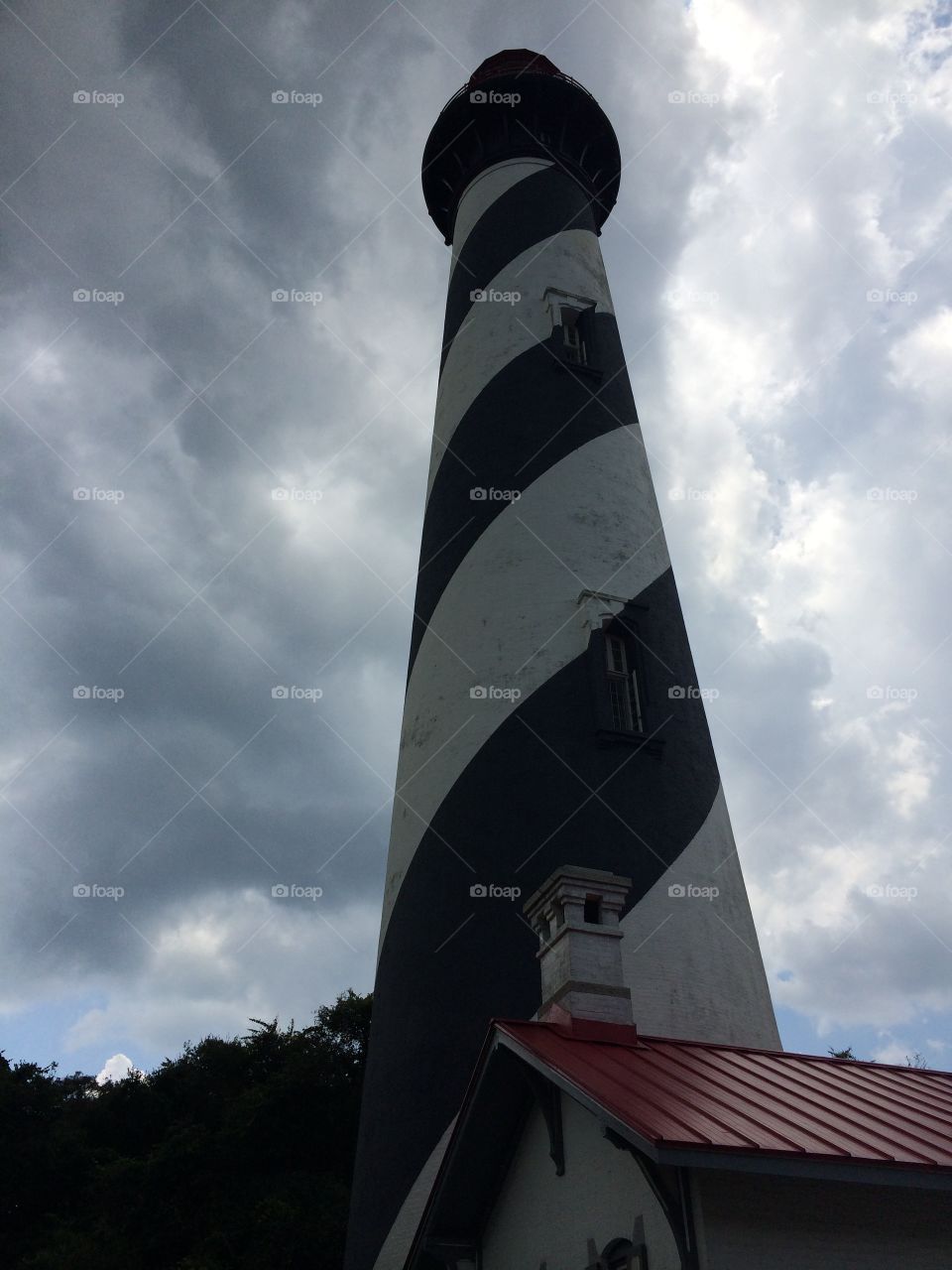 Gloomy skies darken the landscape surrounding the St. Augustine Lighthouse in Florida. 