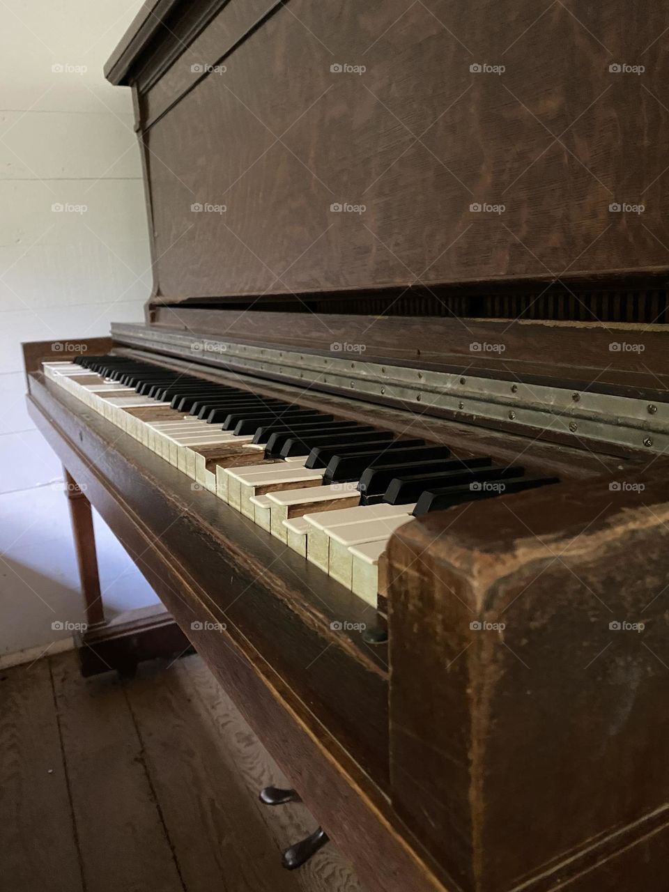 Old piano with broken keys