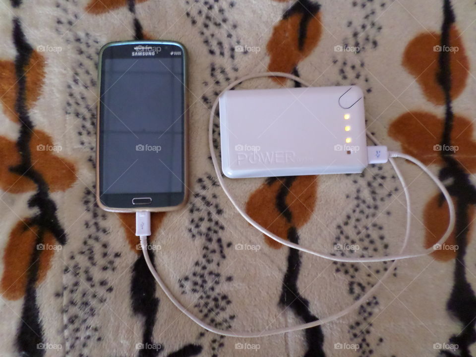 Android phone, charger, power bank. Android phone, charger, power bank
