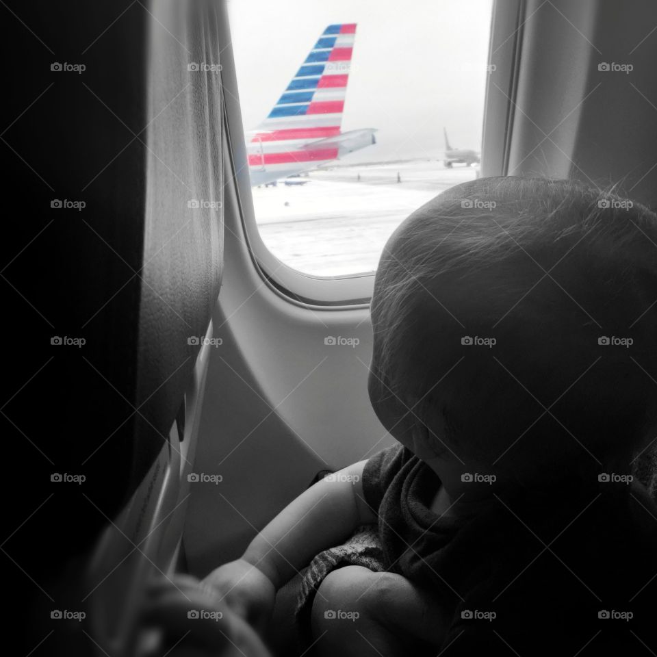 Preparing for my very first takeoff in an airplane. Traveling American airlines and enjoying the view.