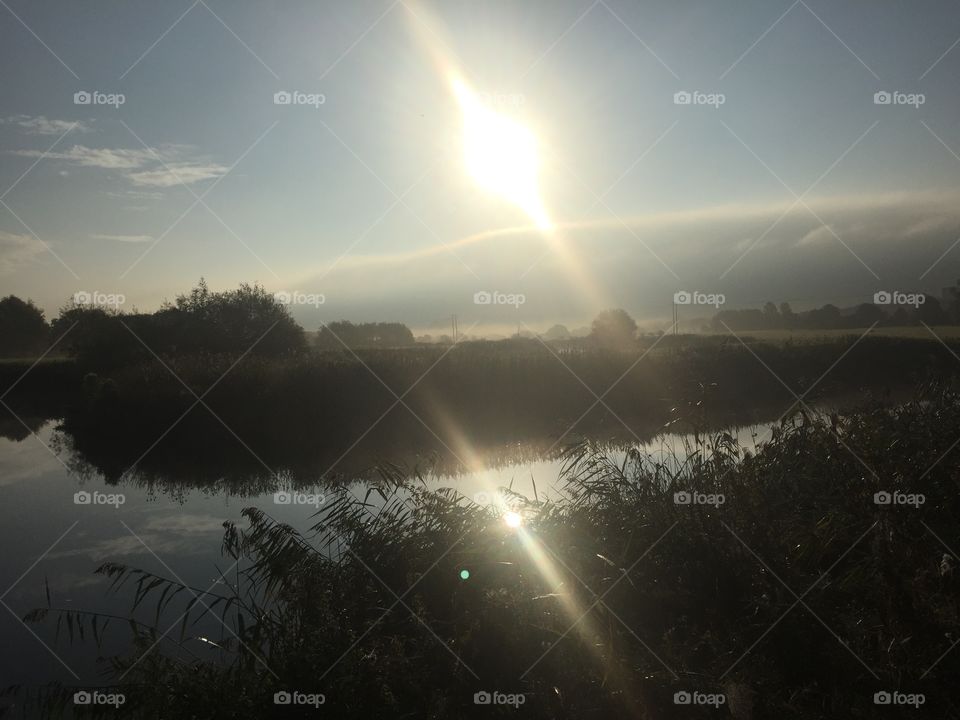 Reflection of sun bouncing off the River Avon at "Swan's Neck" in Eckington, Worcestershire 