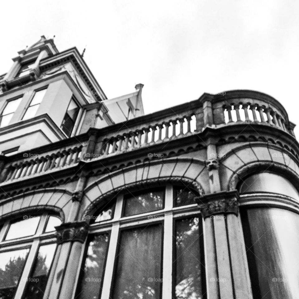 The Frick Building in Pittsburgh Pennsylvania showing the detail of architecture in black and white photograph