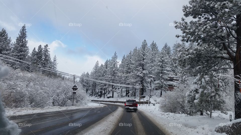 Driving to work in the snow . Had to take a picture of the morning snowfall on my way to work in South Lake Tahoe, CA 
