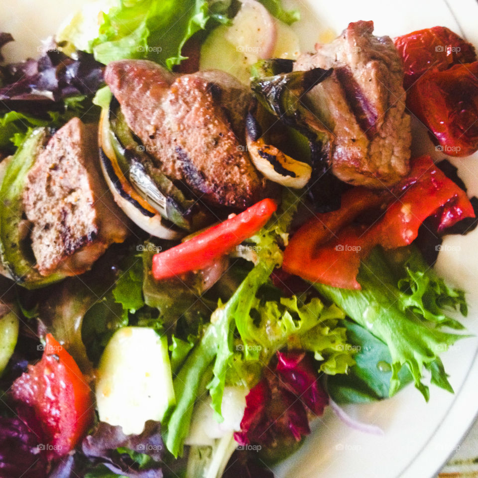 Healthy salad with kebab